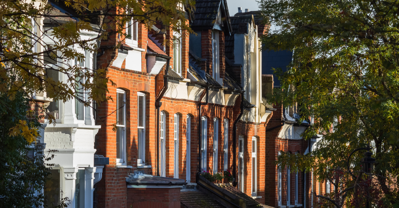 Houses along a street with autumn sun