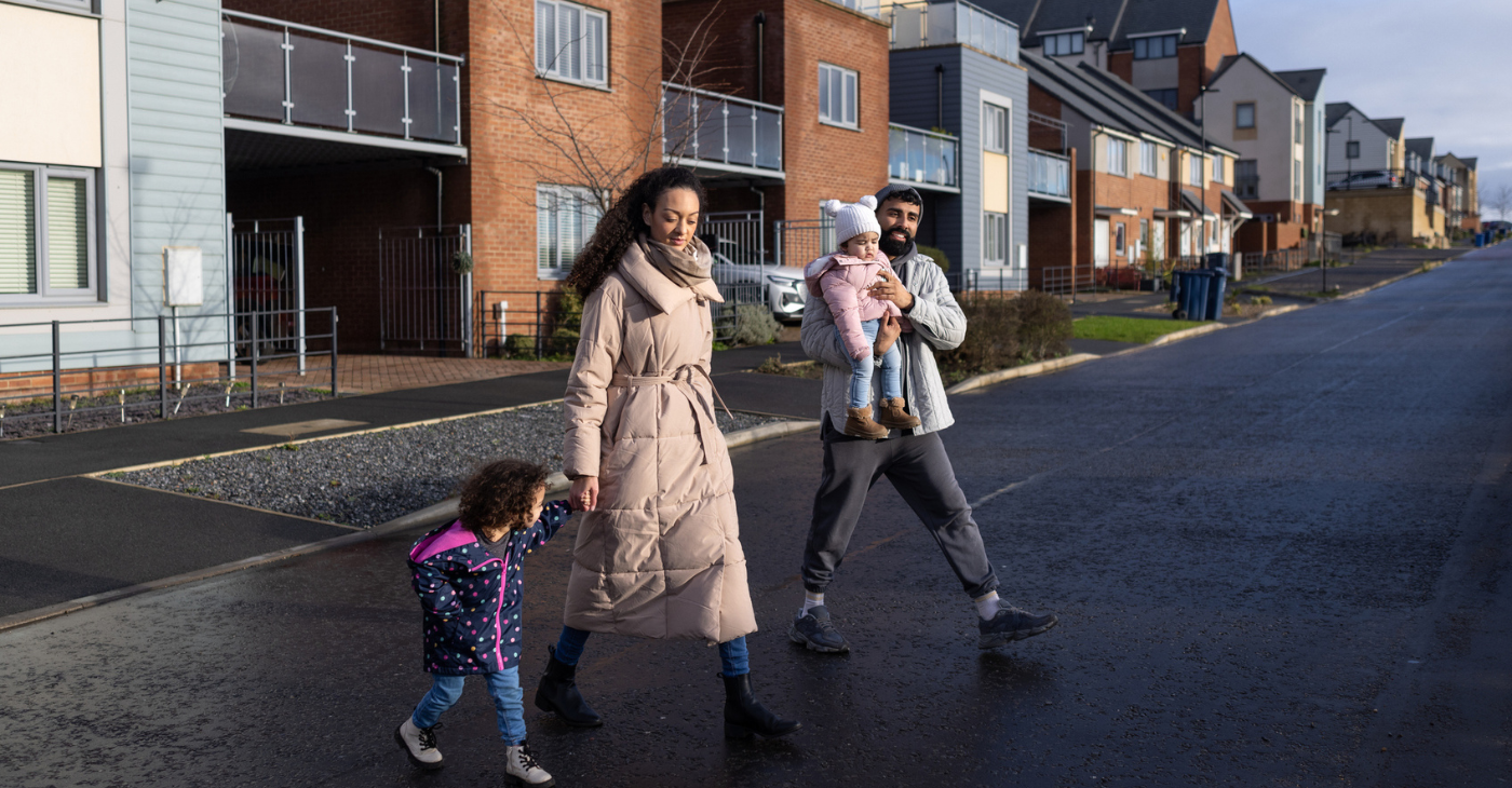 Family walking around their neighbourhood